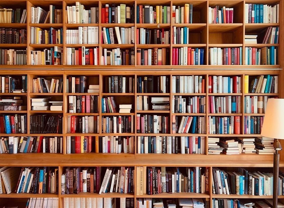 A crowded bookshelf.