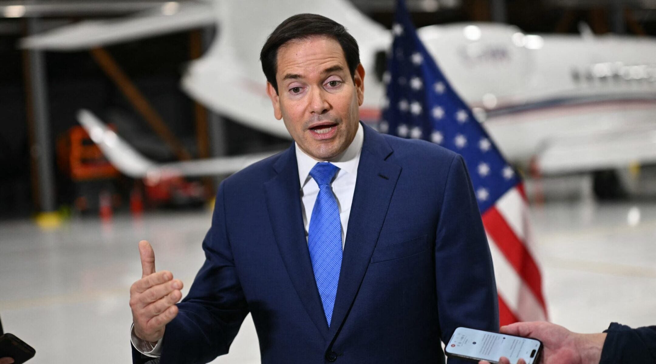 US Secretary of State Marco Rubio speaks to journalists at the airport in Hamilton, Ontario, on Nov. 12, 2025.